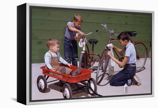 Boys Cleaning their Bikes-William P. Gottlieb-Framed Premier Image Canvas