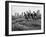 Boys Climbing About on Rock Formation in Central Park as Essex House Looms Amidst Skyline of City-Bill Ray-Framed Photographic Print