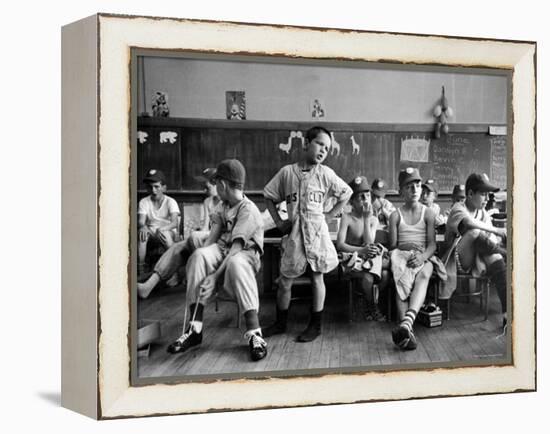 Boys Club Little League Baseball Players Putting on Their Uniforms Prior to Playing Game-Yale Joel-Framed Premier Image Canvas