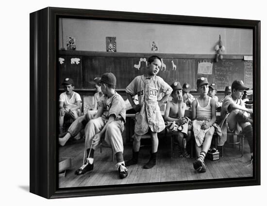 Boys Club Little League Baseball Players Putting on Their Uniforms Prior to Playing Game-Yale Joel-Framed Premier Image Canvas