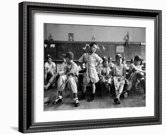 Boys Club Little League Baseball Players Putting on Their Uniforms Prior to Playing Game-Yale Joel-Framed Photographic Print