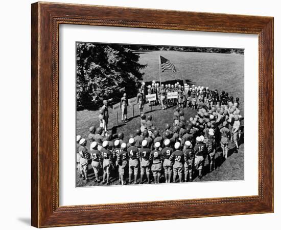 Boys in Circle for Ceremony Before Playing Young American Football League Games-Alfred Eisenstaedt-Framed Photographic Print