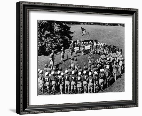 Boys in Circle for Ceremony Before Playing Young American Football League Games-Alfred Eisenstaedt-Framed Photographic Print