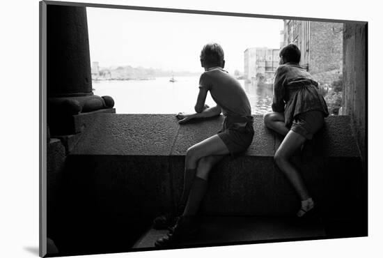 Boys looking from a house in West-Berlin down to the Spree-river in East-Berlin, 1958.-Erich Lessing-Mounted Photographic Print