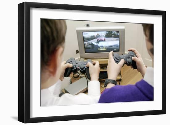 Boys Playing a Video Game-Johnny Greig-Framed Photographic Print