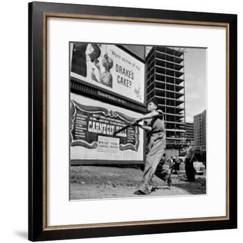 Boys Playing Stickball in Vacant Lot Next to Drake's Cake and Movie "Carnegie Hall"-Ralph Morse-Framed Photographic Print
