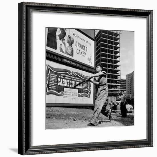 Boys Playing Stickball in Vacant Lot Next to Drake's Cake and Movie "Carnegie Hall"-Ralph Morse-Framed Photographic Print