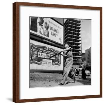Boys Playing Stickball in Vacant Lot Next to Drake's Cake and Movie "Carnegie Hall"-Ralph Morse-Framed Photographic Print