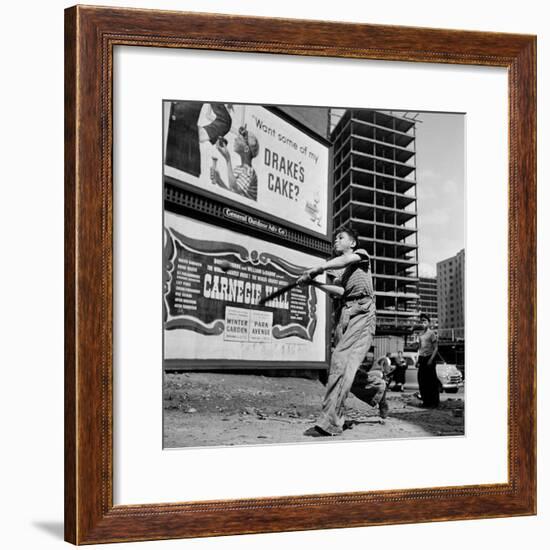 Boys Playing Stickball in Vacant Lot Next to Drake's Cake and Movie "Carnegie Hall"-Ralph Morse-Framed Photographic Print