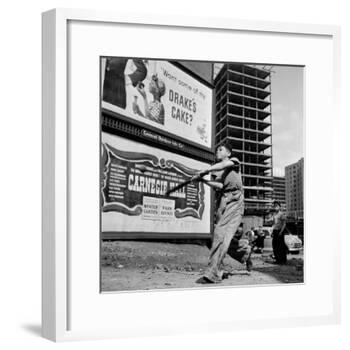Boys Playing Stickball in Vacant Lot Next to Drake's Cake and Movie "Carnegie Hall"-Ralph Morse-Framed Photographic Print