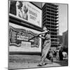 Boys Playing Stickball in Vacant Lot Next to Drake's Cake and Movie "Carnegie Hall"-Ralph Morse-Mounted Photographic Print