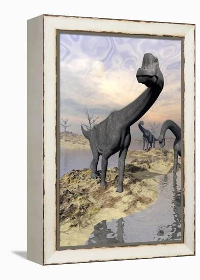 Brachiosaurus Dinosaurs Near Water with Reflection by Sunset and Full Moon-null-Framed Stretched Canvas