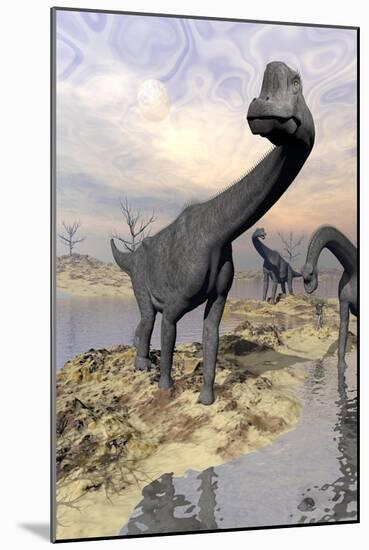 Brachiosaurus Dinosaurs Near Water with Reflection by Sunset and Full Moon-null-Mounted Art Print