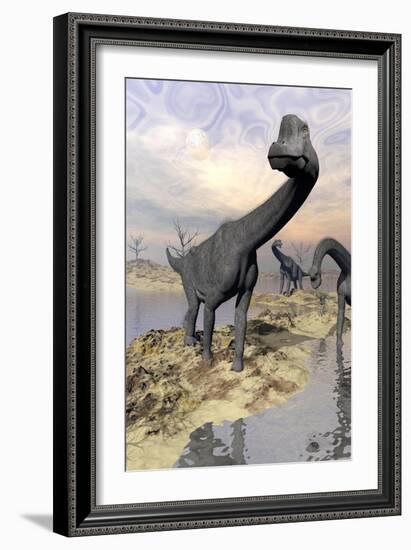 Brachiosaurus Dinosaurs Near Water with Reflection by Sunset and Full Moon-null-Framed Art Print