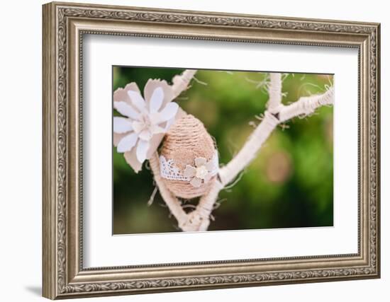 Branch, wrapped, jute cord, blossoms, Easter egg, close up,-mauritius images-Framed Photographic Print