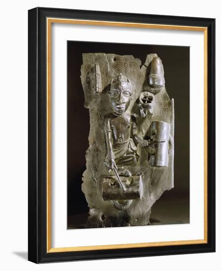 Brass plaque with a representation of a drummer, Benin, Nigeria, probably early 17th century-Werner Forman-Framed Giclee Print