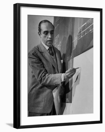 Brazilian Architect Oscar Niemeyer Discussing Design for the United Nations Headquarters Buildings-null-Framed Premium Photographic Print