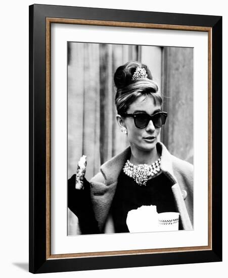 Breakfast at Tiffany's, Audrey Hepburn Eating Between Scenes on Set, 1961-null-Framed Photo