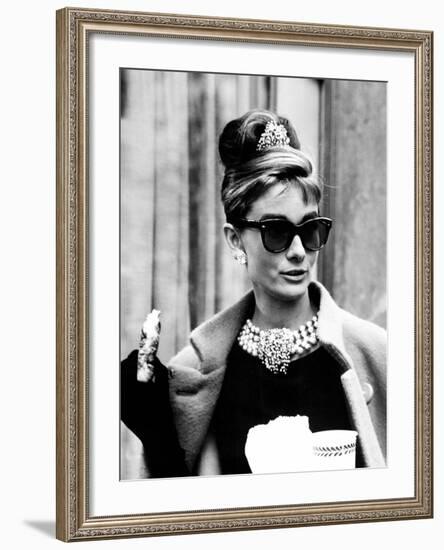 Breakfast at Tiffany's, Audrey Hepburn Eating Between Scenes on Set, 1961-null-Framed Photo