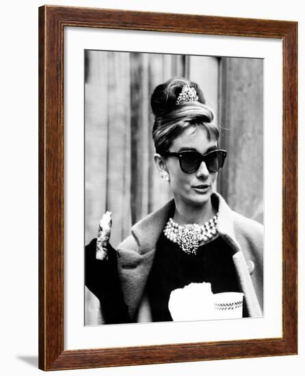 Breakfast at Tiffany's, Audrey Hepburn Eating Between Scenes on Set, 1961-null-Framed Photo