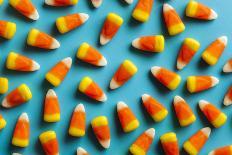 Colorful Candy Corn for Halloween on a Background-Brent Hofacker-Photographic Print