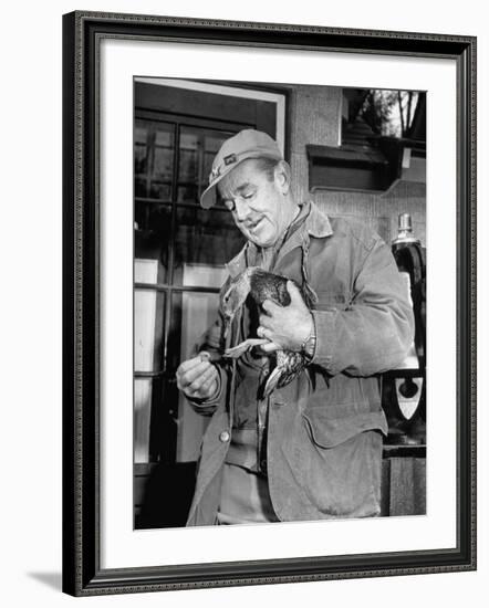 Brewing Scion August A. Busch, Jr. Banding Wounded Duck on His Family's Estate-Margaret Bourke-White-Framed Photographic Print