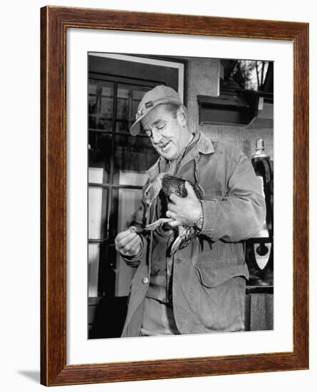 Brewing Scion August A. Busch, Jr. Banding Wounded Duck on His Family's Estate-Margaret Bourke-White-Framed Photographic Print