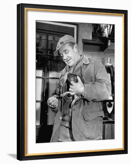 Brewing Scion August A. Busch, Jr. Banding Wounded Duck on His Family's Estate-Margaret Bourke-White-Framed Photographic Print