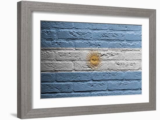 Brick Wall With A Painting Of A Flag, Argentina-Micha Klootwijk-Framed Art Print