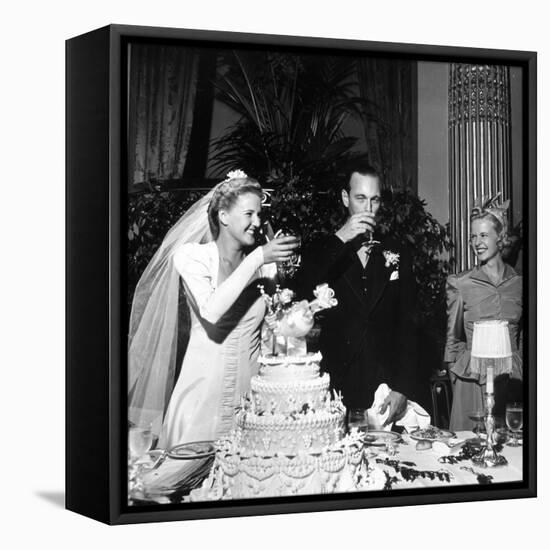 Bride and Groom Drinking Champagne After Wedding Ceremony in Manhattan-John Phillips-Framed Premier Image Canvas