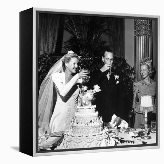 Bride and Groom Drinking Champagne After Wedding Ceremony in Manhattan-John Phillips-Framed Premier Image Canvas