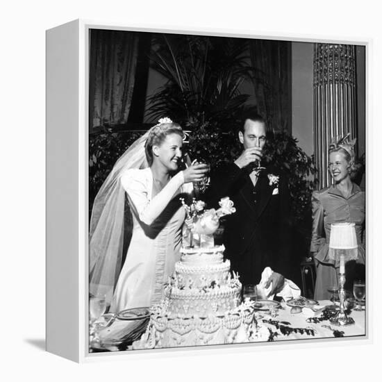 Bride and Groom Drinking Champagne After Wedding Ceremony in Manhattan-John Phillips-Framed Premier Image Canvas