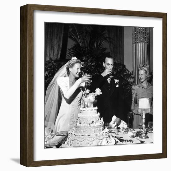 Bride and Groom Drinking Champagne After Wedding Ceremony in Manhattan-John Phillips-Framed Photographic Print