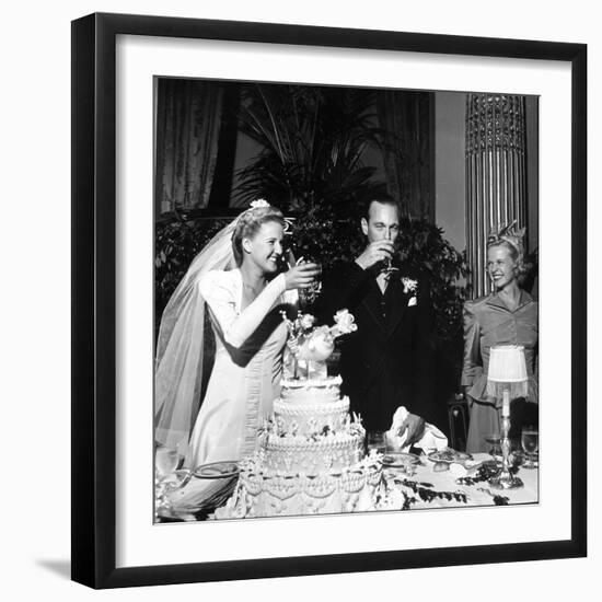 Bride and Groom Drinking Champagne After Wedding Ceremony in Manhattan-John Phillips-Framed Photographic Print