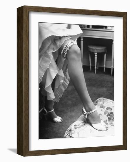 Bride Barbara Alvin Wearing a Blue Garter on Her Leg for Her Wedding-Nina Leen-Framed Photographic Print