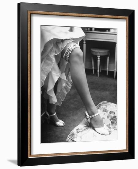 Bride Barbara Alvin Wearing a Blue Garter on Her Leg for Her Wedding-Nina Leen-Framed Photographic Print