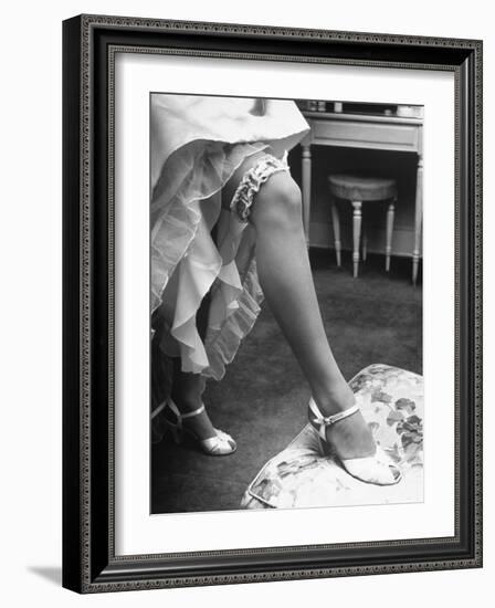 Bride Barbara Alvin Wearing a Blue Garter on Her Leg for Her Wedding-Nina Leen-Framed Photographic Print