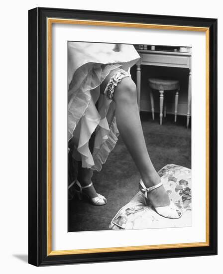 Bride Barbara Alvin Wearing a Blue Garter on Her Leg for Her Wedding-Nina Leen-Framed Photographic Print