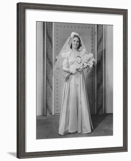 Bride Holding a Bouquet-null-Framed Photo