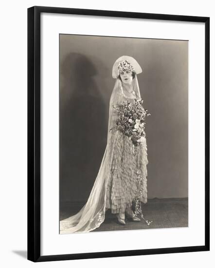 Bride Wearing Ruffled Wedding Gown and Flowered Headdress-null-Framed Photo