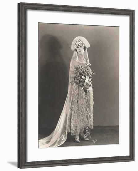 Bride Wearing Ruffled Wedding Gown and Flowered Headdress-null-Framed Photo