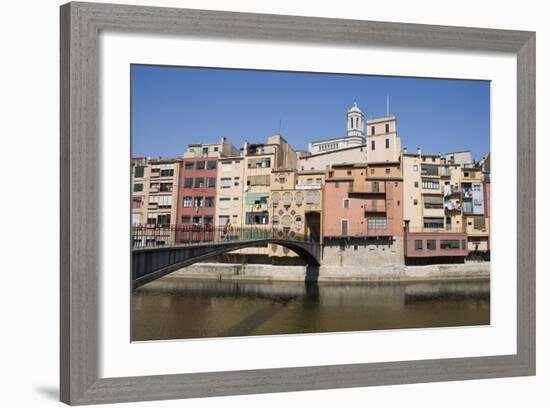 Bridge and Brightly Painted Houses on the Bank of the Riu Onyar-Martin Child-Framed Photographic Print