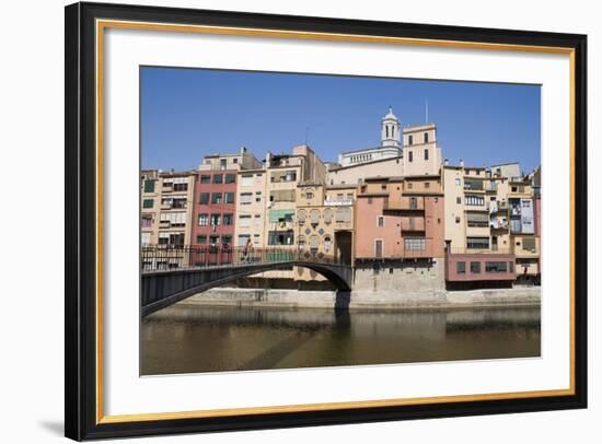 Bridge and Brightly Painted Houses on the Bank of the Riu Onyar-Martin Child-Framed Photographic Print