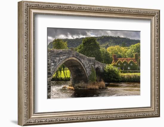 Bridge and ivy covered cottage, Conwy Valley, North Wales, UK-Ross Hoddinott-Framed Photographic Print