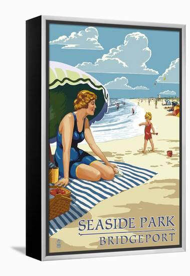 Bridgeport, Connecticut - Woman on the Beach-Lantern Press-Framed Stretched Canvas