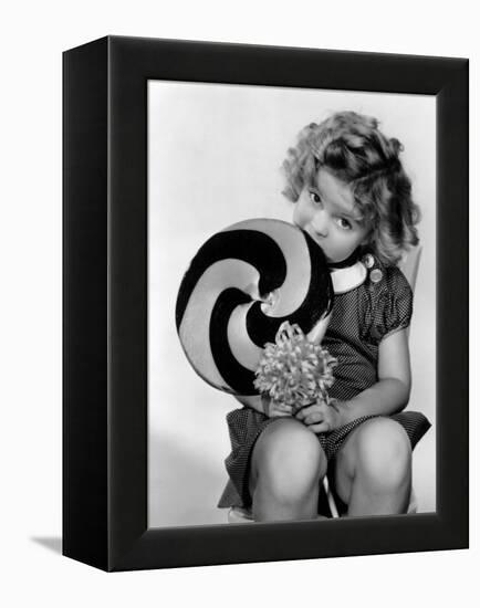 Bright Eyes, Shirley Temple Eating a Big Lollipop, 1934-null-Framed Stretched Canvas