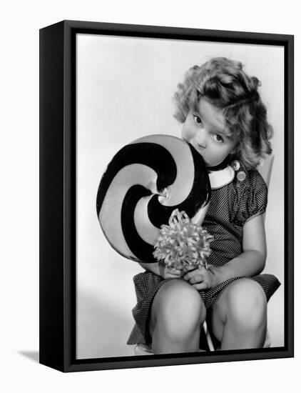 Bright Eyes, Shirley Temple Eating a Big Lollipop, 1934-null-Framed Stretched Canvas