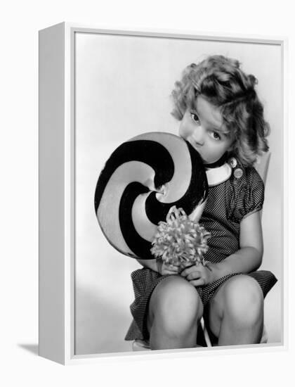 Bright Eyes, Shirley Temple Eating a Big Lollipop, 1934-null-Framed Stretched Canvas