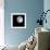 Bright Full Moon in a Black Night Sky-Janis Miglavs-Framed Photographic Print displayed on a wall