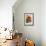 Bright orange flowers on display on kitchen table-Stacy Bass-Framed Photo displayed on a wall